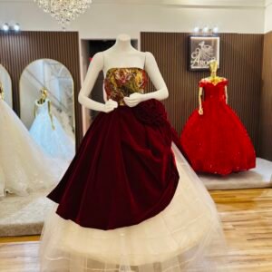 Strapless ballgown features a painted-style bodice in rich shades of red, gold, and orange with a large sculpted rose (Medium Size - Burgundy Red )