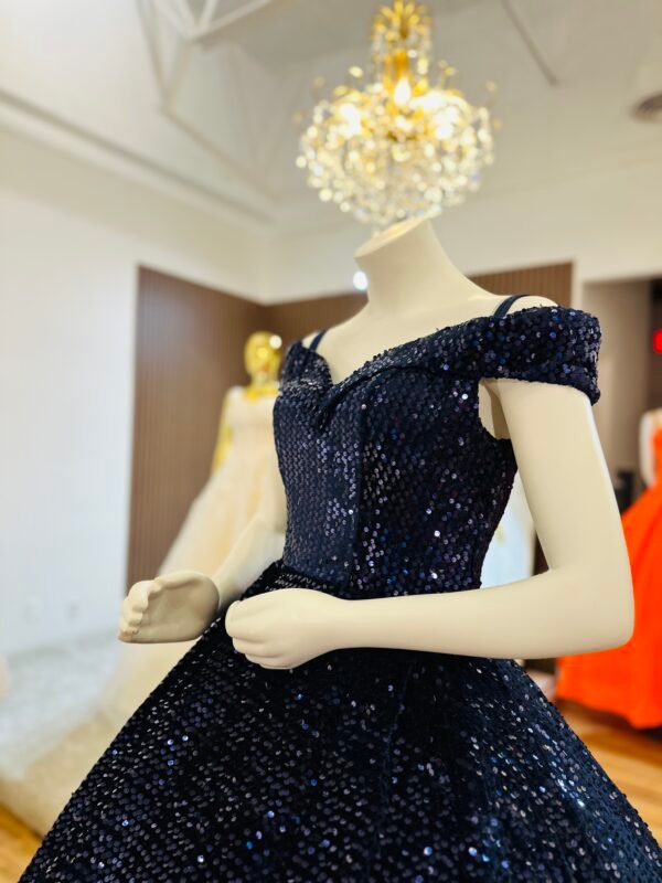 Deep sapphire gown features an off-shoulder neckline and a flowing train with sparkling sequins and finished with a matching ribbon corset (Large Size - Navy) - Image 3