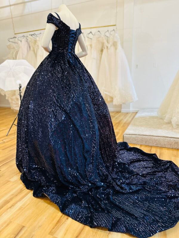 Deep sapphire gown features an off-shoulder neckline and a flowing train with sparkling sequins and finished with a matching ribbon corset (Large Size - Navy) - Image 2